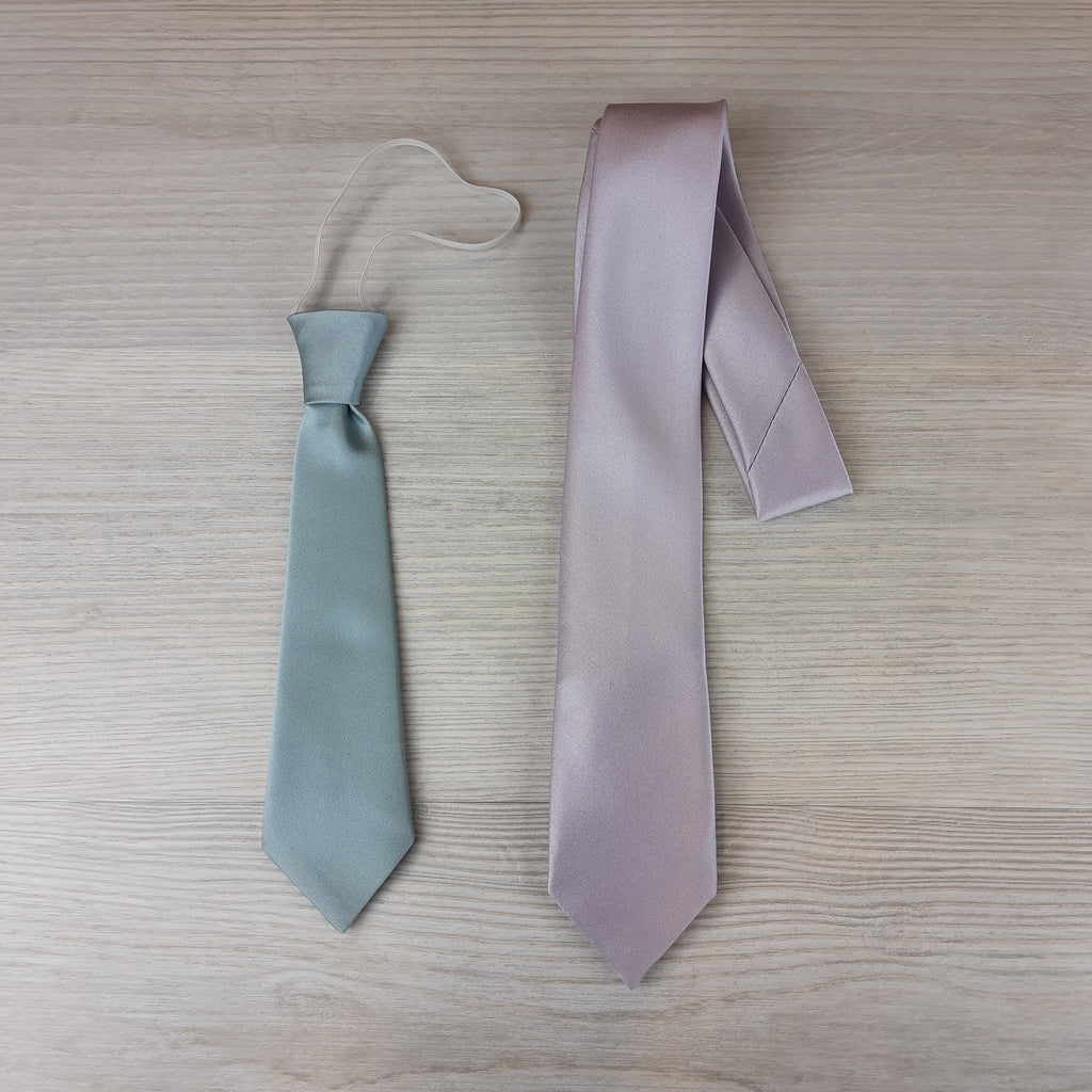 Midnight Boys Ties shown in elastic mint and self-tie lilac styles. Perfect polyester neckties for children aged 5-12, dry clean only.