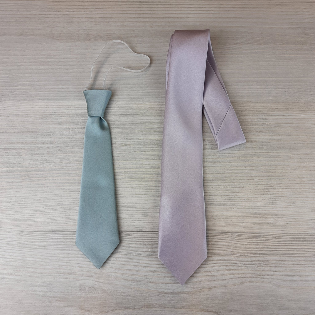Two boys ties in pastel shades, one clip-on and one standard, showcasing size options for children's polyester neckties.