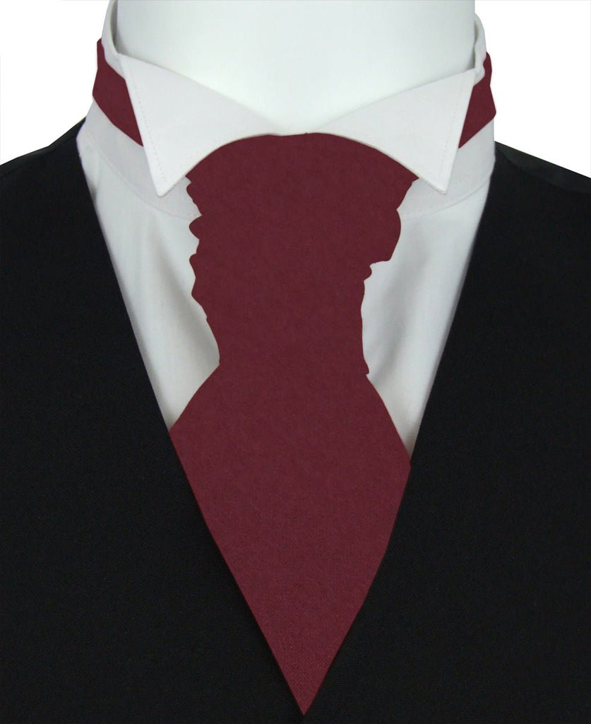 Boys wedding cravat in burgundy polyester, styled with a white shirt and black vest. Adjustable and one-size fits most kids aged 5-12.