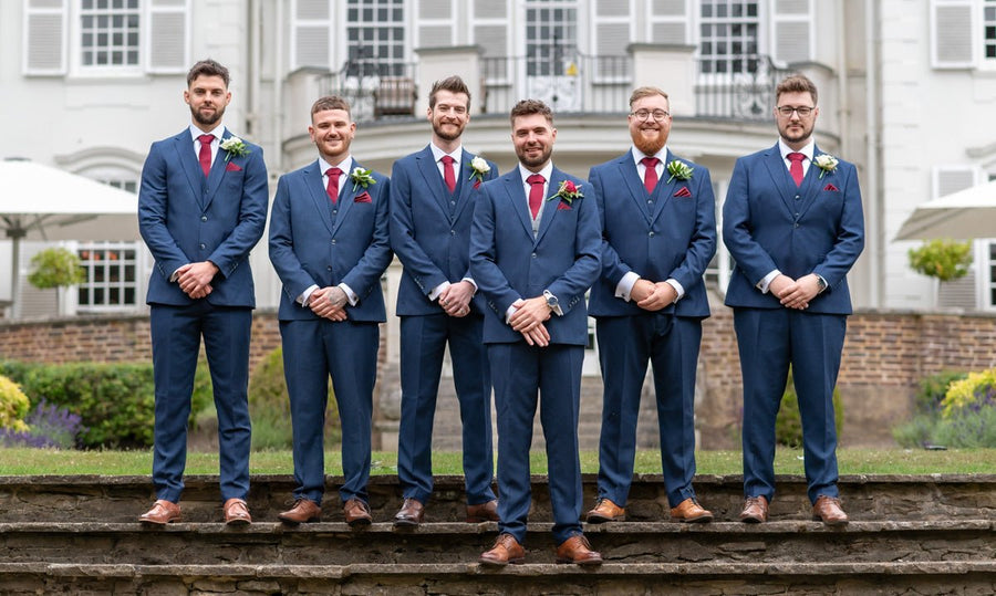 Groomsmen wearing navy suits with Burgundy Pocket Square - Satin Finish | 25cm x 25cm, Polyester. Stylish wedding accessory for coordinated looks.