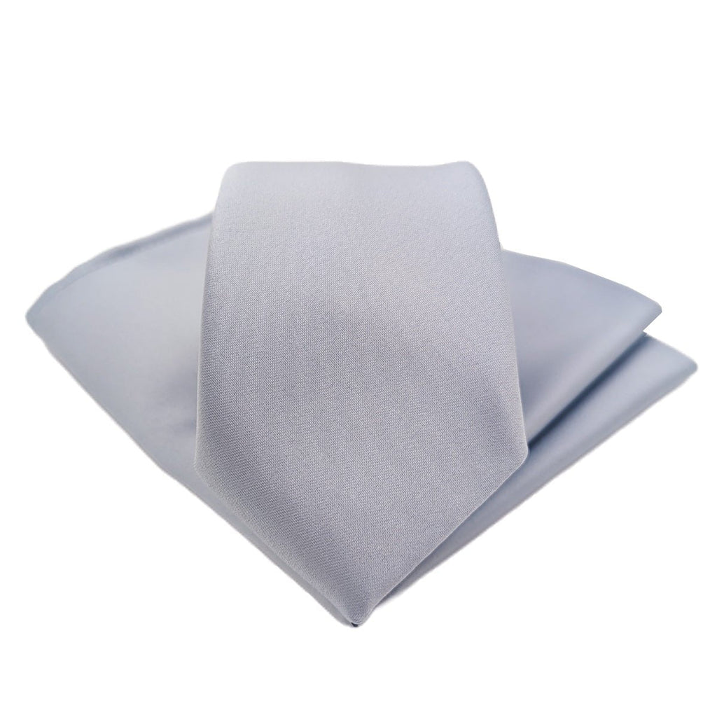 Dusty Blue Boys Tie folded neatly to highlight its elegant finish. A stylish handmade necktie for children's formalwear.