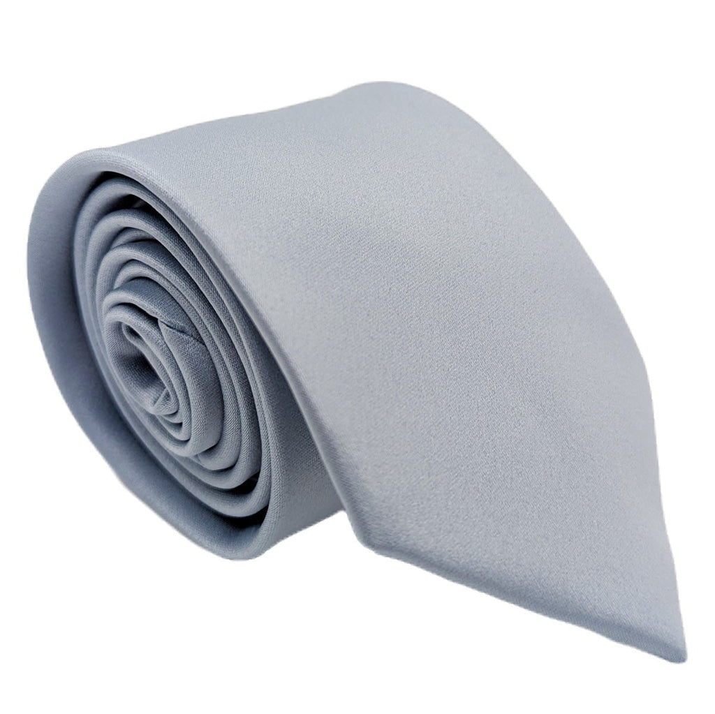 Handmade dusty blue wedding tie rolled neatly, ideal groom accessory for elegant wedding attire. Soft satin finish enhances formal look.
