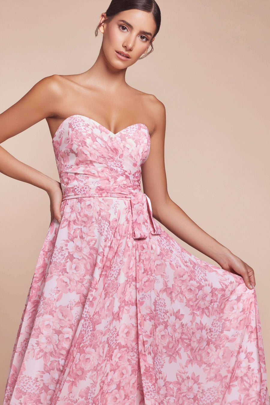 Close-up of pink Floral Chiffon Strapless Dress showing ruched bodice and floral print, perfect for formal events or prom.