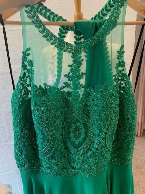 Emerald Double Lace Dress MC181479 with intricate beaded lace bodice and sheer neckline, ideal for prom or wedding guest outfits in sizes 4-24.