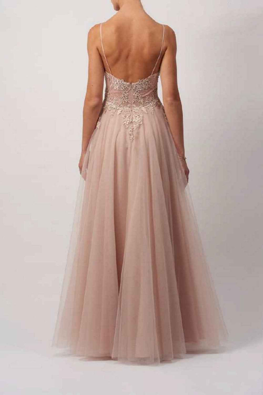 Back view of Red Lace Tulle Dress - Prom MC18108 showing lace-up bodice and layered tulle skirt in blush lining. Elegant and romantic design.