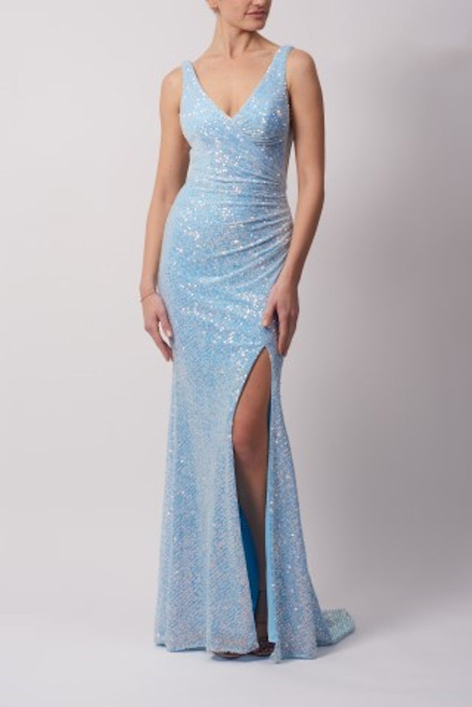 Aqua blue sequin mascara dress on a model
