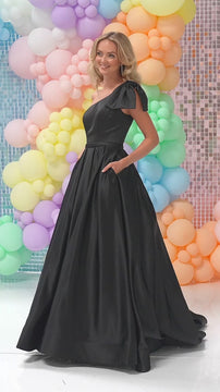 Green satin evening gown with one-shoulder and bow detail