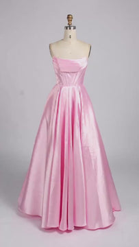 model walking in a pink ballgown