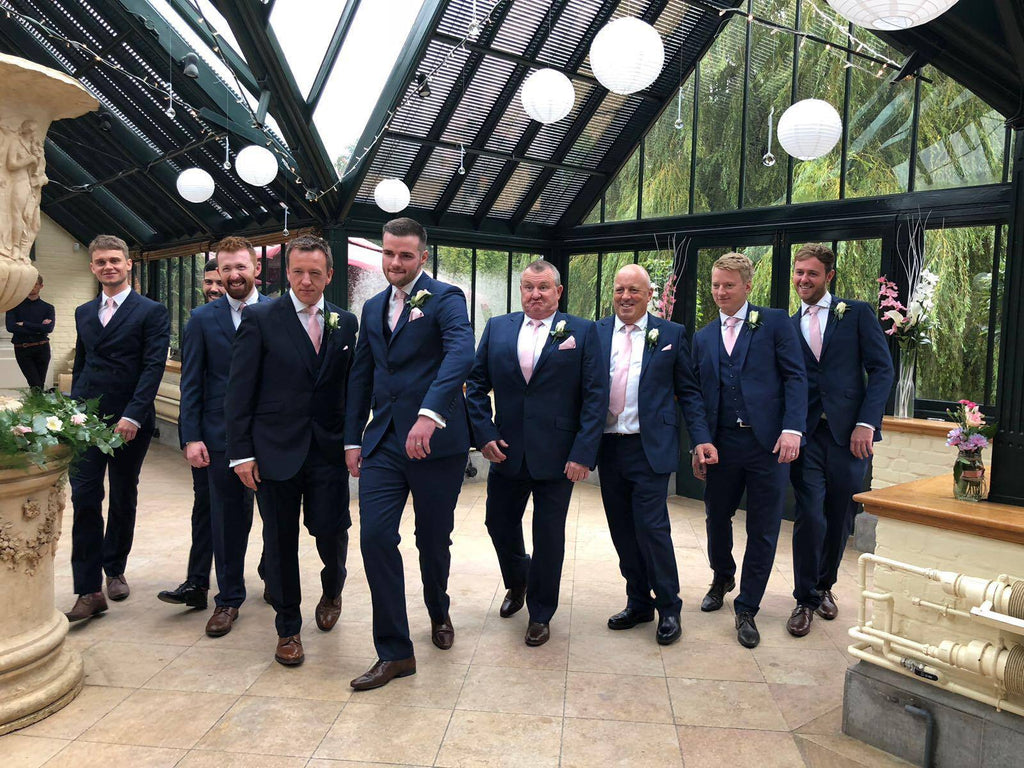 Wedding party in navy suits with Rose Gold Pocket Square - Wedding Accessory | Handmade, Durable. Perfect for groomsmen coordination and elegance.