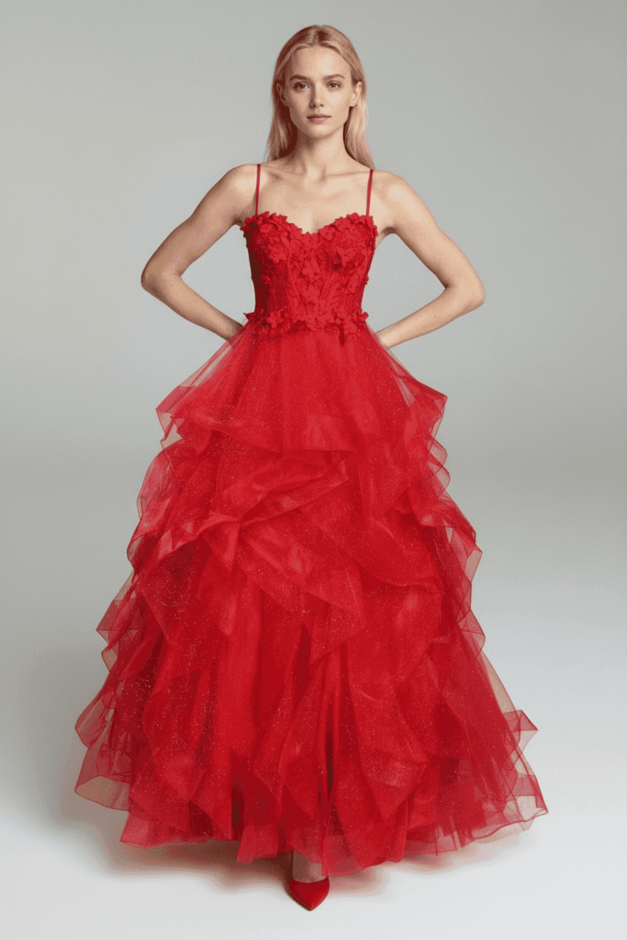 Jessica Stuart Ball Gown with 3D floral lace bodice, tiered ruffled tulle skirt, and spaghetti straps in vibrant red for prom or formal events.