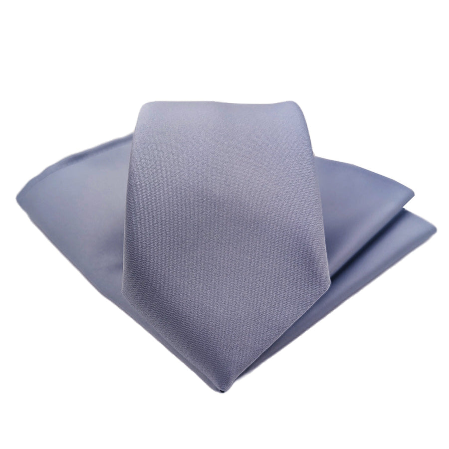Smokey Blue Wedding Tie folded with matching pocket square, a versatile handmade accessory ideal for groomsmen or formal events.