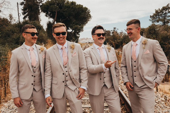 Groomsmen wearing Vintage Rose Pocket Square - Handkerchief Polyester | Dry Clean with beige suits, perfect for coordinated wedding attire.