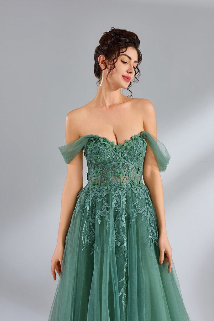 close up of model in green strapless gown