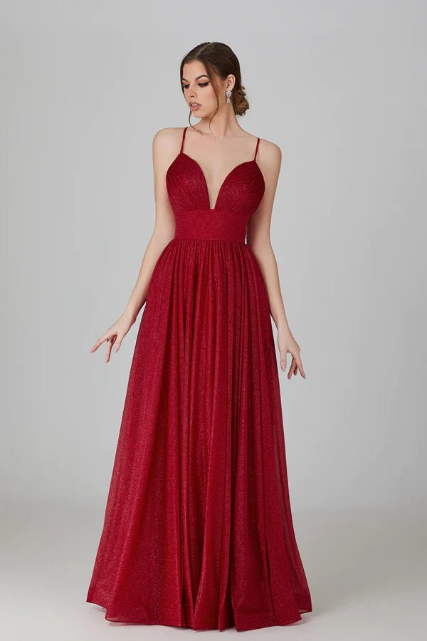 brunette model in a fulled skirted red glitter prom dress
