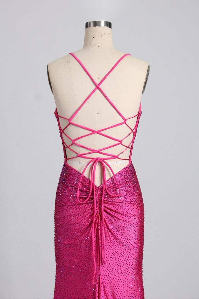 close up back view of hot pink rhinestone satin evening dress with lace up back