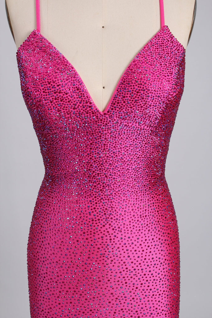 close up of hot pink bejewelled satin evening dress