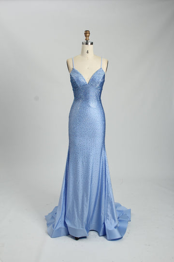 long sparkly blue dress on a mannequin
