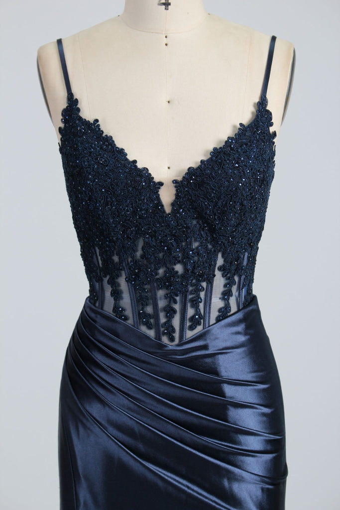 Close up of Navy satin dress embroidered bodice