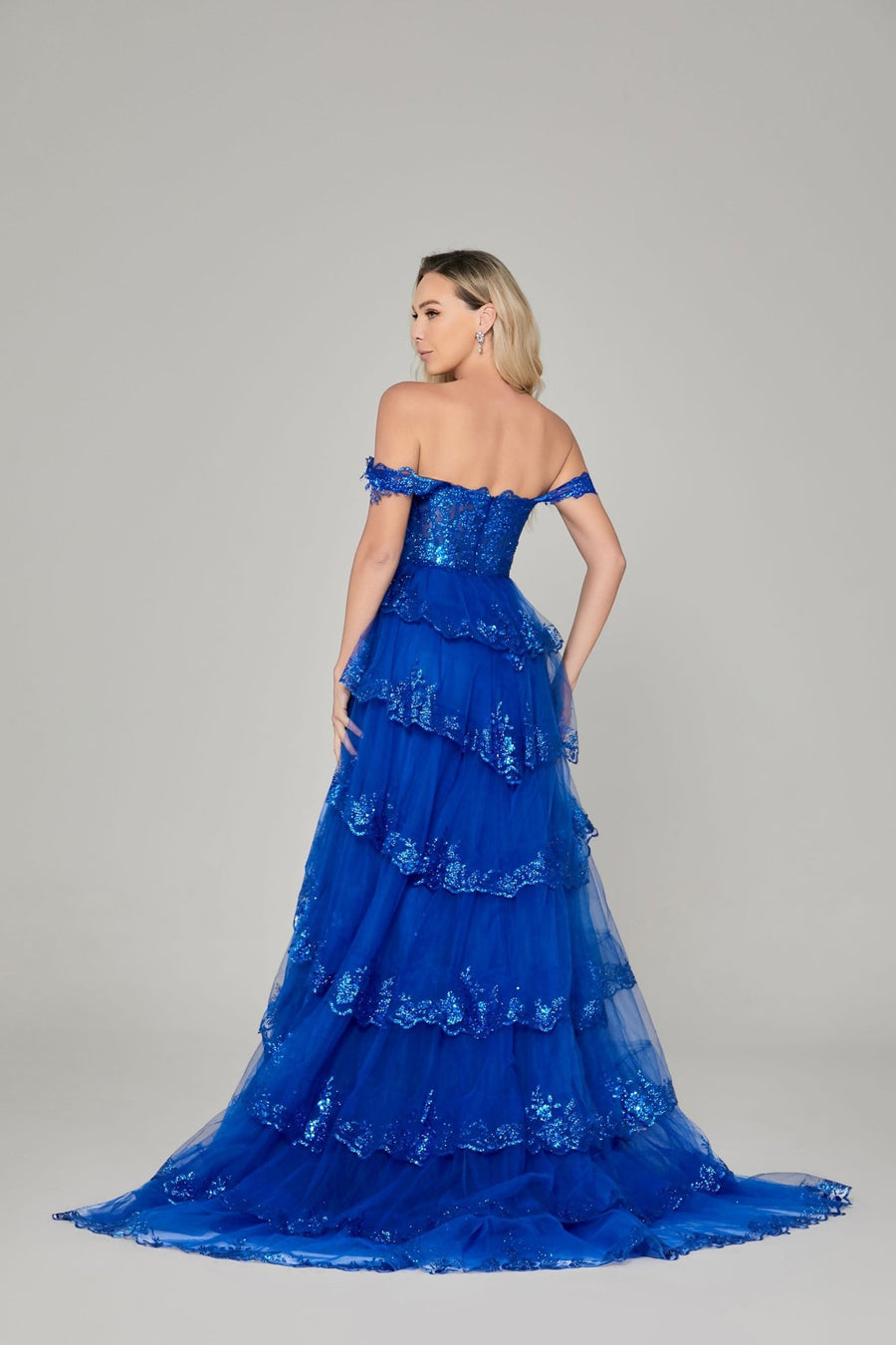 Chloe Lilac Glitter Dress - Off-Shoulder Prom gown in vibrant blue with sequin lace appliques and tiered tulle layers, featuring a sweep-brush train.