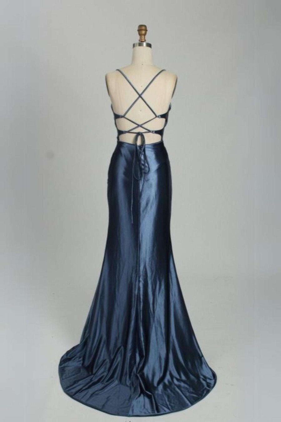 Back view of Ella Evening Dress in dusty blue satin with lace-up corset, thin straps, and floor-length draped skirt with high slit.