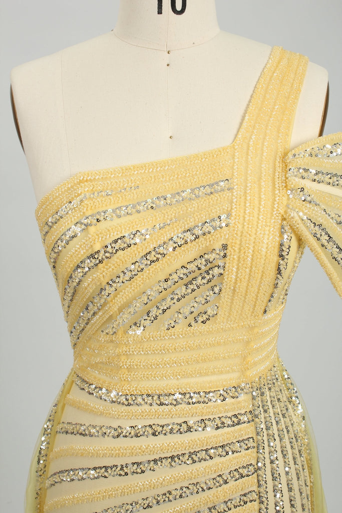 close up of yellow beaded chiffon gown