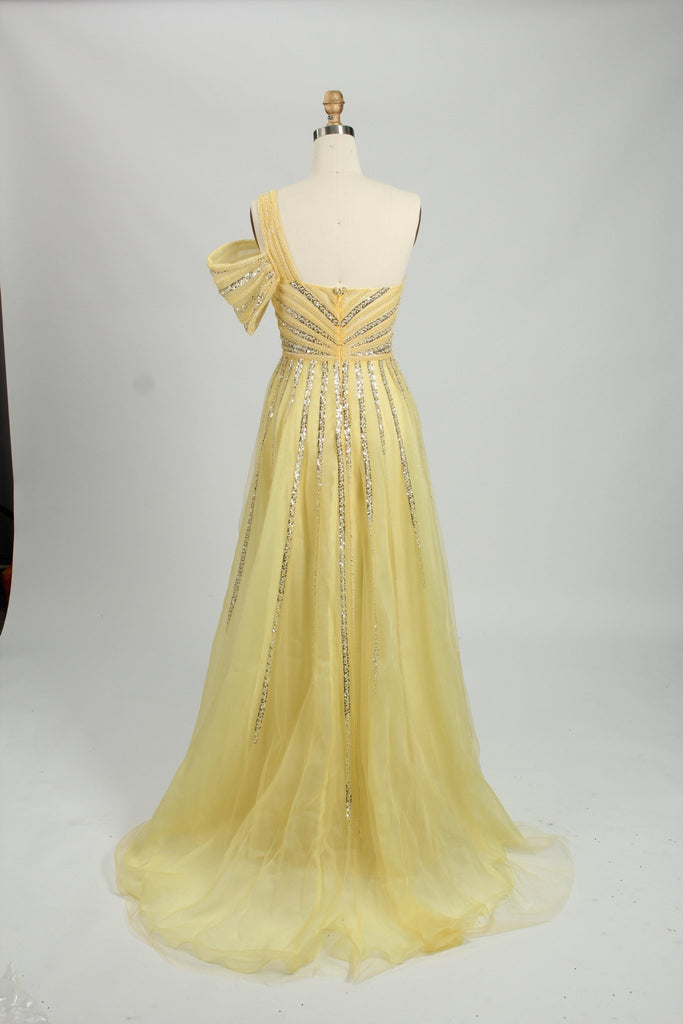 back view of yellow beaded chiffon gown