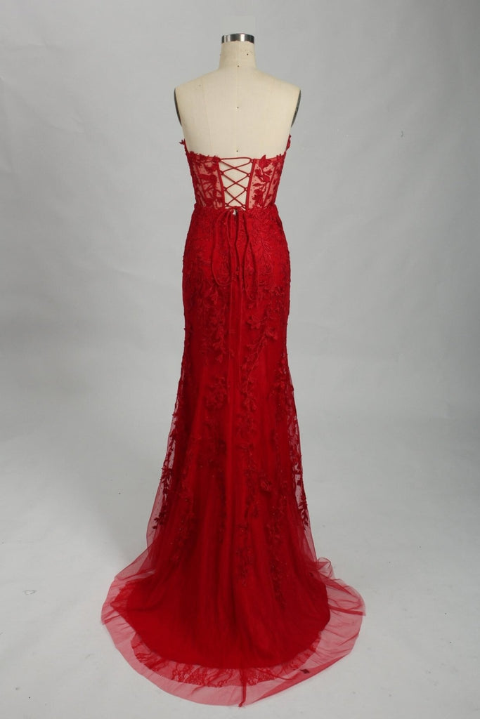 back view of red corset evening dress with lace details 