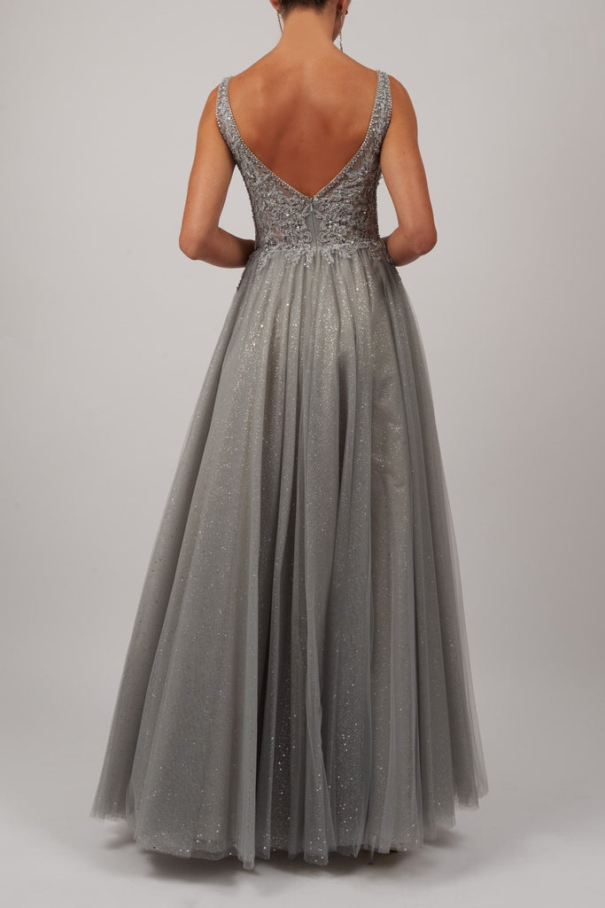 back view of silver ballgown with embellished top and tulle skirt