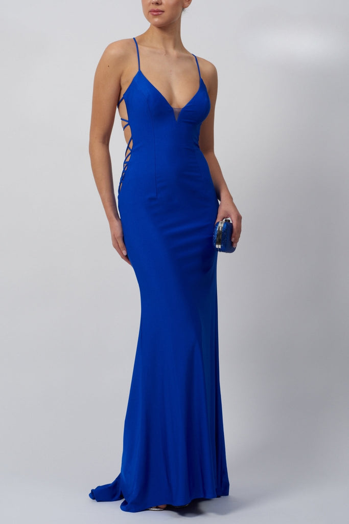 Royal blue long evening dress with thin straps and crisscross details on sides