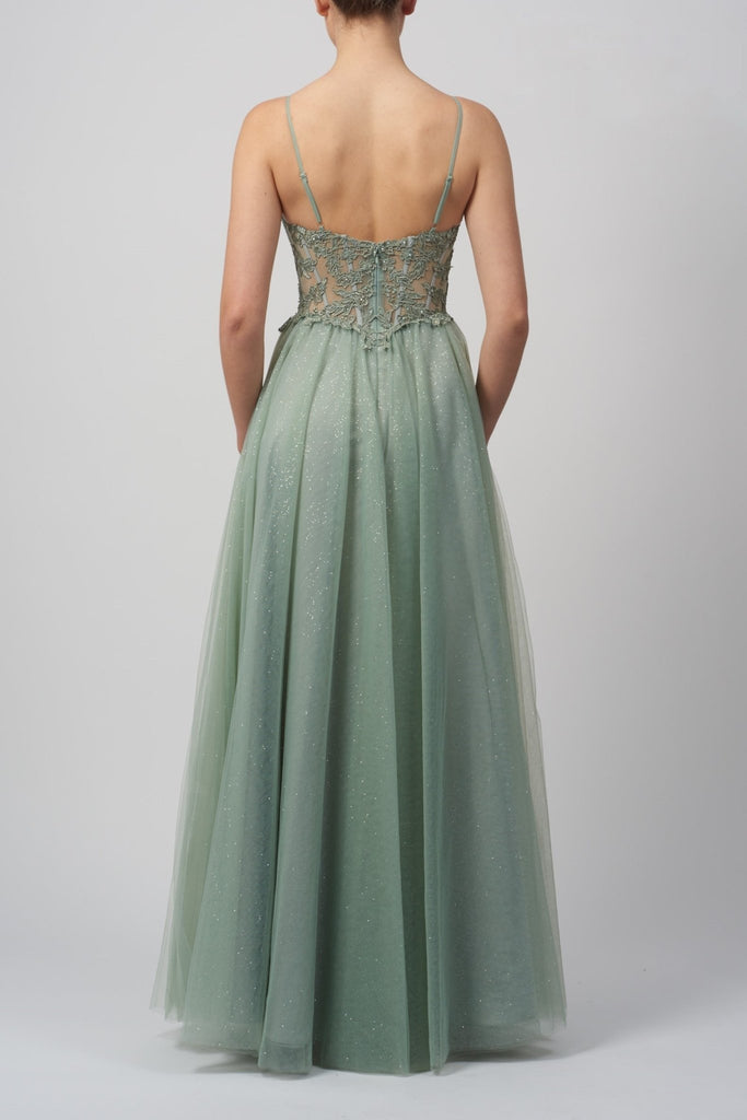 back view of misty green corset prom dress