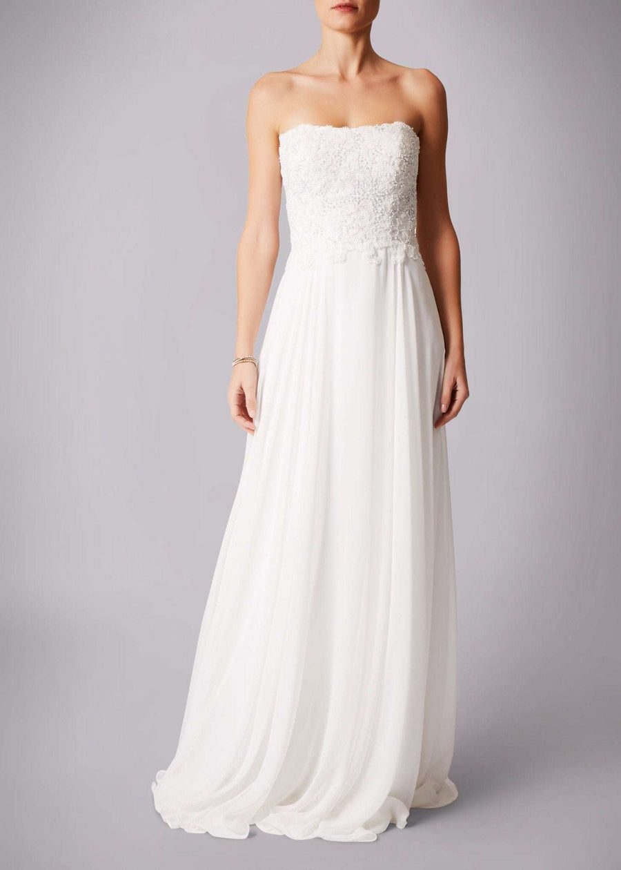 Mascara London Ivory sequined bustier wedding gown MC181283P featuring a strapless lace bodice and flowing chiffon skirt. Ideal for bridal elegance.