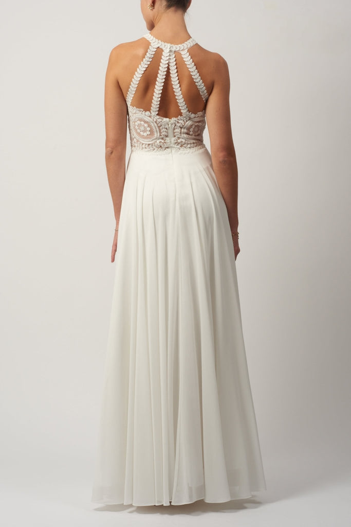 Back view of Ivory Chiffon evening dress with halterneck top with lace embellishments