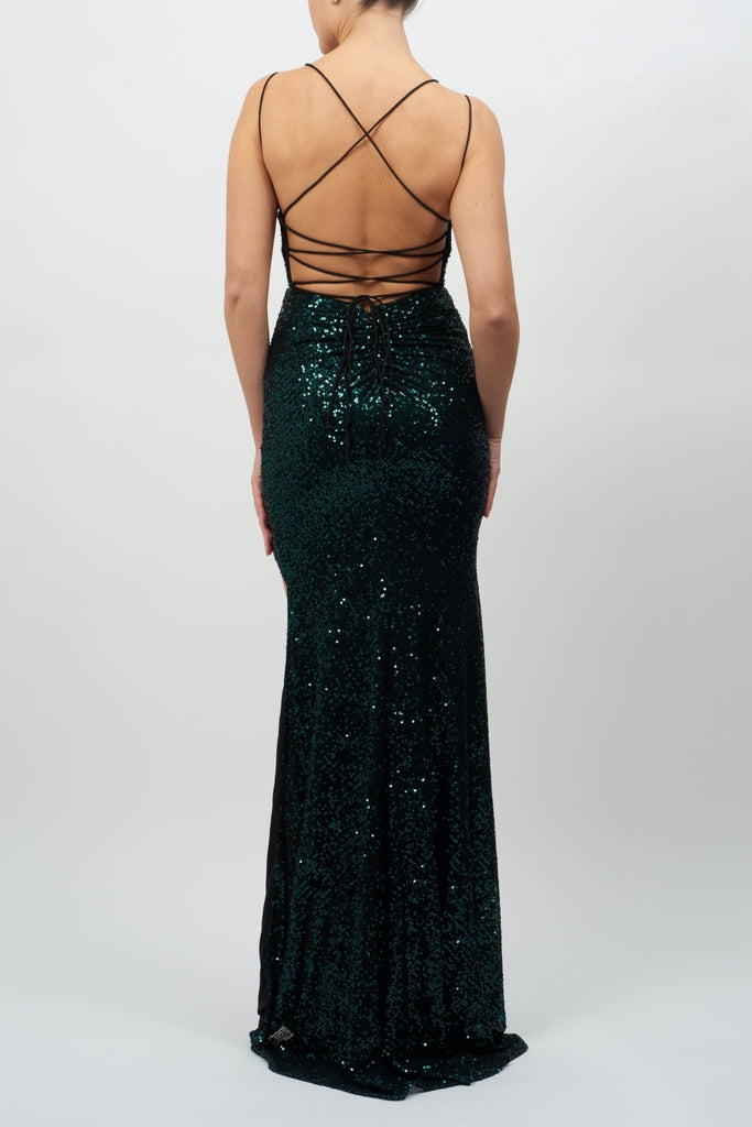back view of a lady wearing forest green sequin long evening dress