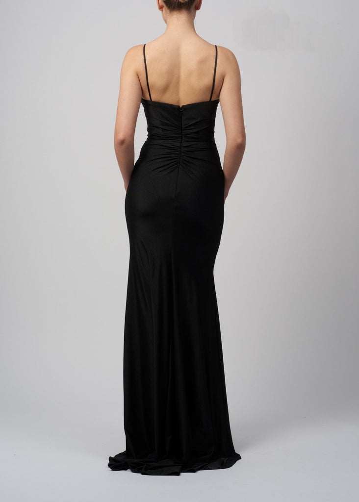 back view of a model in a fitted prom dress