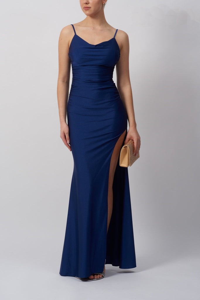 model wearing fitted navy slip long prom dress