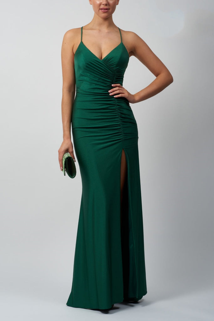 lady wearing green rouched jersey dress with high split