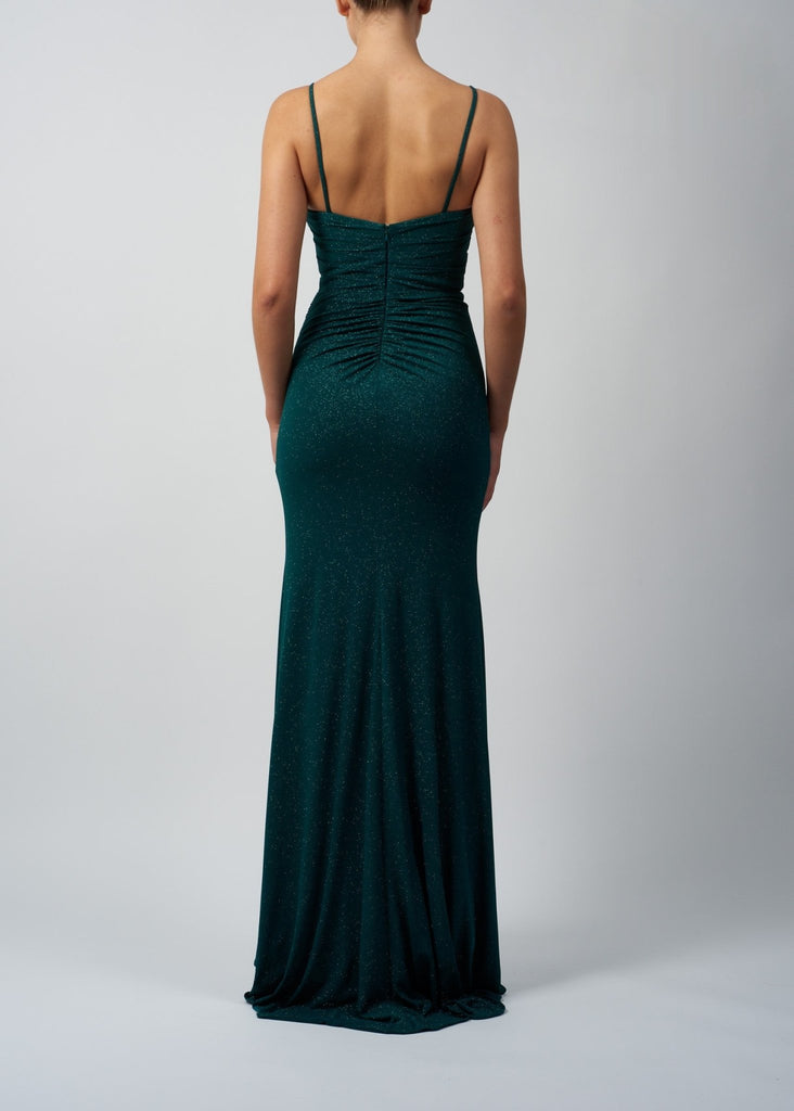 back image of green glitter prom dress