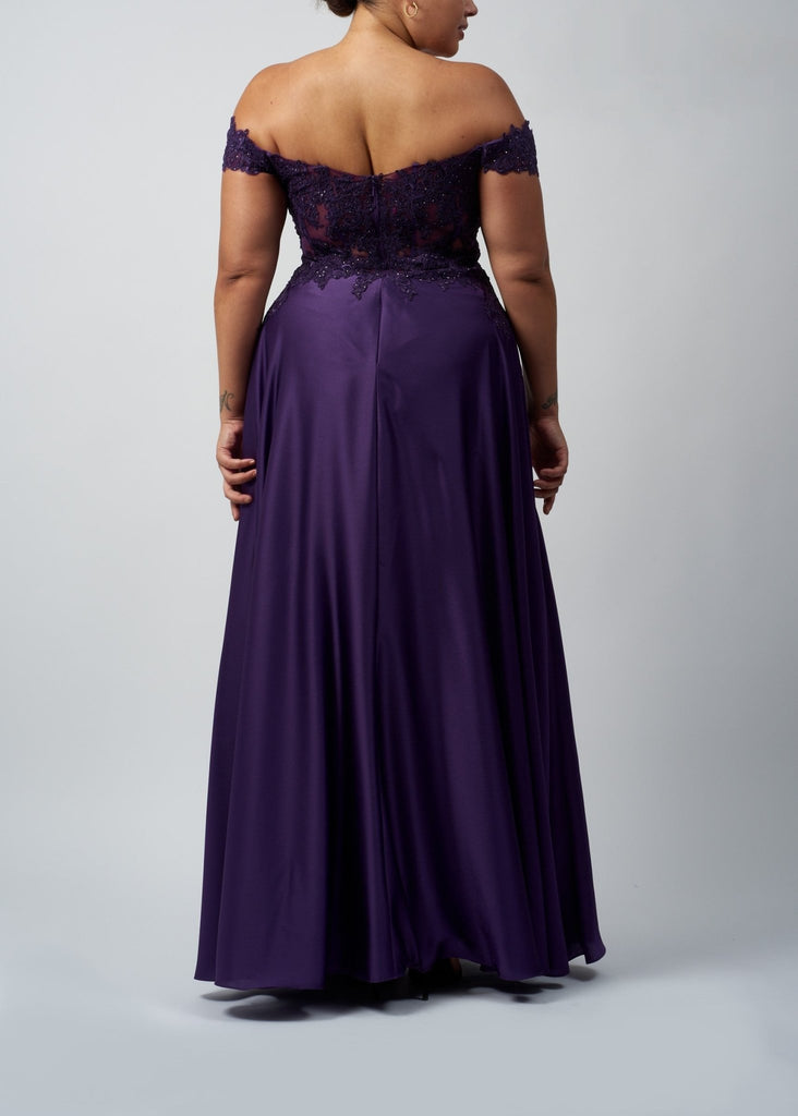 back view of a plus size lady wearing lace and satin evening dress in dark purple