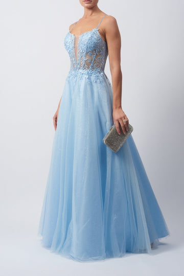 Model standing in a Baby blue Tulle Glitter Ballgown 