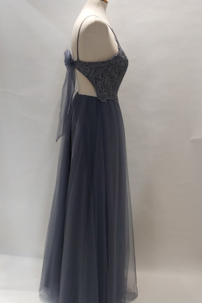 side view of charcoal gown with a bow tie feature