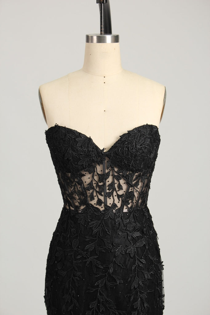 close up of a black lace lola dress on a mannequin