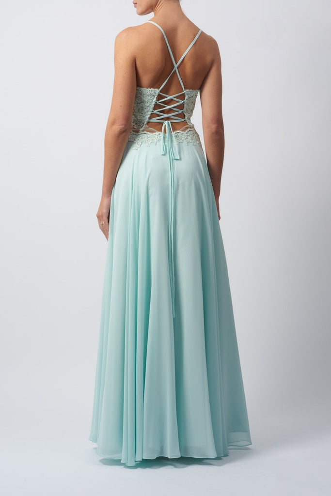 Young lady standing in a Mint Chiffon Prom Dress back image