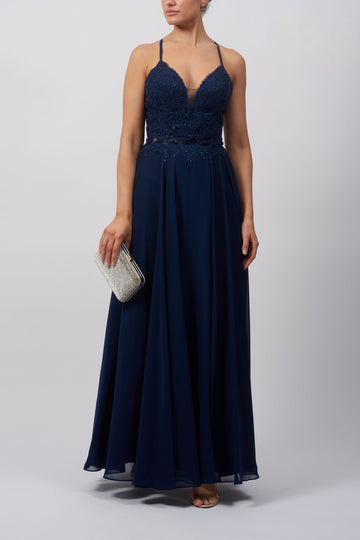 Young lady standing in a Navy Chiffon Prom Dress