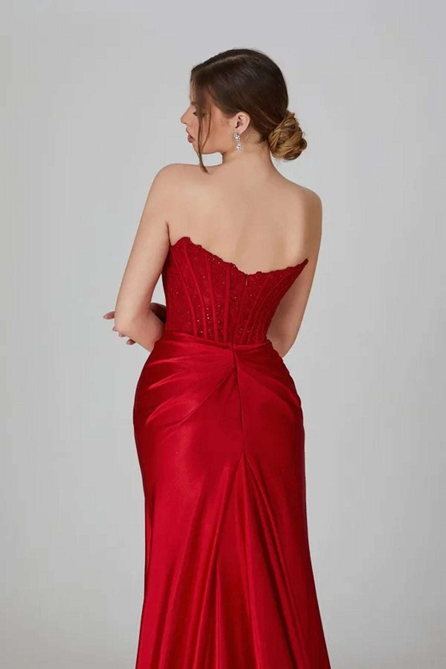  Young female standing in a Satin Corset Mermaid Dress close up of back