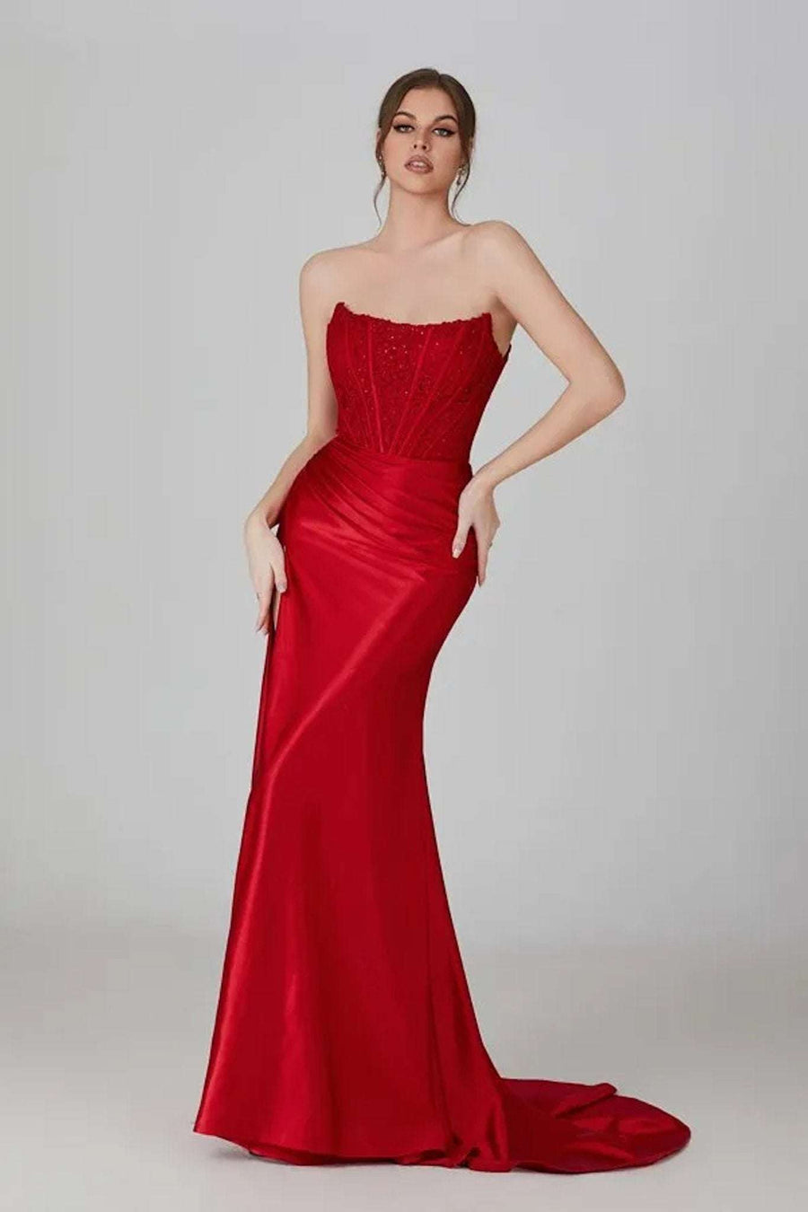  Young female standing in a Satin Corset Mermaid Dress