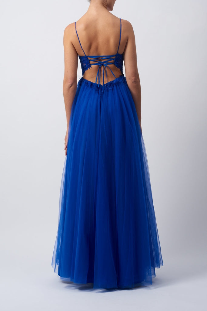 Young female standing in a Royal Blue Low Back Lace Tulle Dress back image