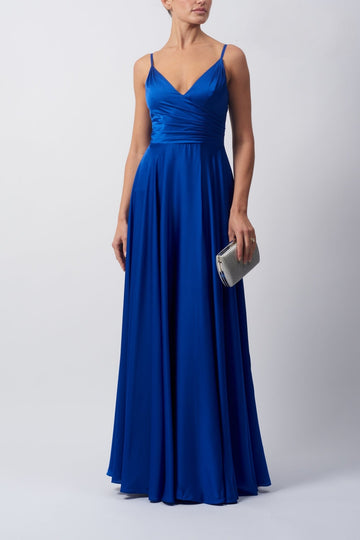Young female standing in a Royal blue Satin Prom Dress