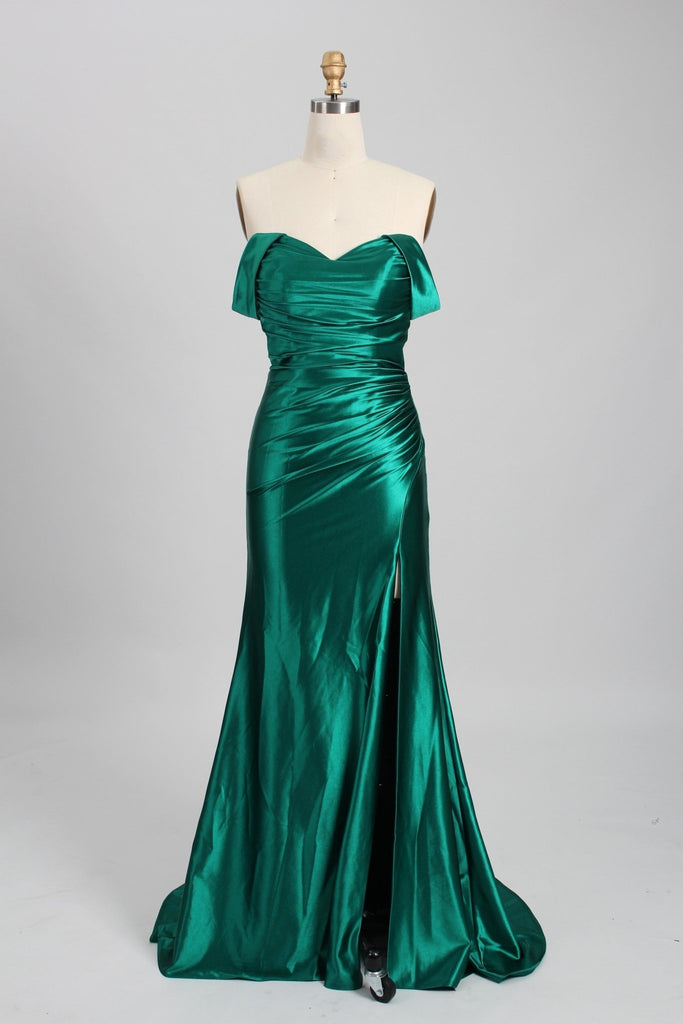 green satin bardot ruby dress on mannequin
