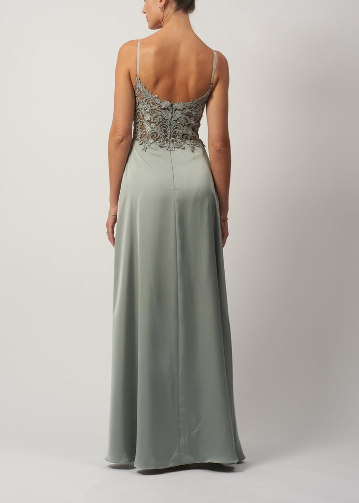 back view of mascara london dress with thin straps, floral lace bodice and satin skirt