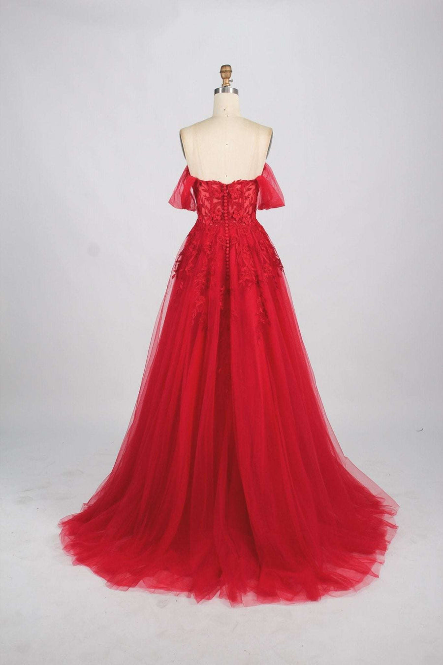 Back view of YLONA Prom Dress in red with corset top and flowing tulle skirt. Features lace detailing and detachable shoulder straps.